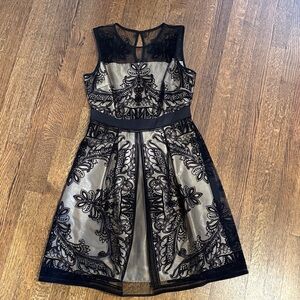 Chic Black and Cream Lace Midi Dress